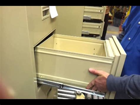 remove drawer from metal cabinet